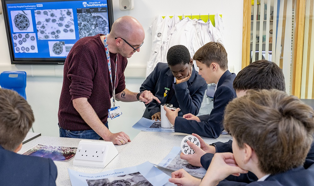 Students engaging in a Meet the Scientist session with James Thompson